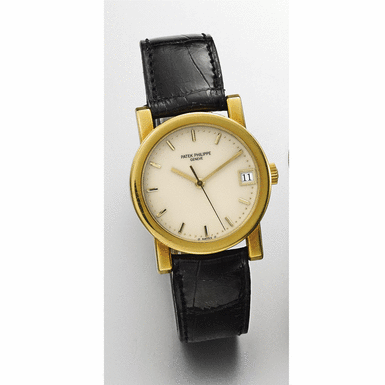 PATEK PHILIPPE - A Gold Automatic Sweep Seconds Wristwatch with Date 1993, Movement No. 1912379, Case No. 2938046, Ref. 5012J