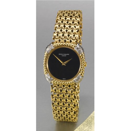 Patek Philippe A LADY'S GOLD AND DIAMOND CUSHION-FORM BRACELET WATCH WITH ONYX DIAL CIRCA 1977, NO. 1274711, REF. 4303