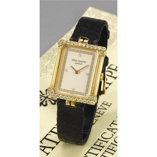 Patek Philippe A LADY'S RECTANGULAR GOLD AND DIAMOND WRISTWATCH LES GRECQUE, 1983, REF. 4632, NO. 1.408.163