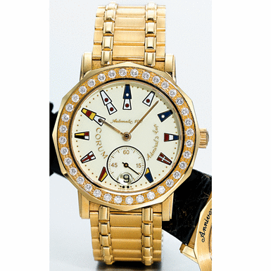 CORUM, A GOLD AND DIAMOND SET LIMITED EDITION AUTOMATIC WRISTWATCH WITH DATE AND BRACELET CIRCA 1995 ADMIRALS CUP NO 21/100