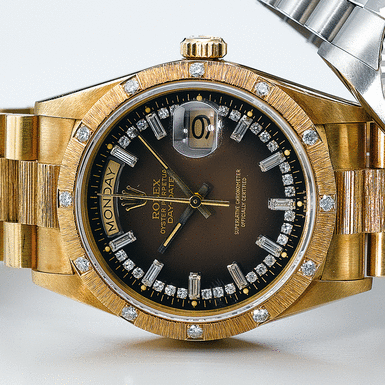 ROLEX, A GOLD AND DIAMOND AUTOMATIC CENTRE SECONDS WRISTWATCH WITH DAY, DATE AND BRACELET CIRCA 1985 REF 18108 OYSTER PERPETUAL DAY-DATE