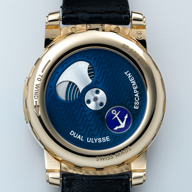 ULYSSE NARDIN, AN UNUSUAL AND OVERSIZED PINK GOLD WRISTWATCH WITH SEVEN-DAY KARRUSEL MOVEMENT AND DUAL DIRECT ESCAPEMENT CIRCA 2003 REF 026-88 FREAK NO 028&NBSP