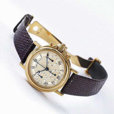 BREGUET - A Mid-Sized Gold Automatic Chronograph Wristwatch with Registers and Date CIRCA 2000 REF 4586D MARINE