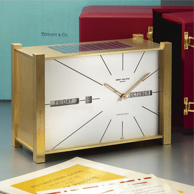 PATEK PHILIPPE - Retailed by Tiffany Co.: A Fine and Rare Gilt-Brass Solar Powered Perpetual Calendar Desk Timepiece with Digital Display CIRCA 1966 REF 503EQ MVT 874021 CASE 1559