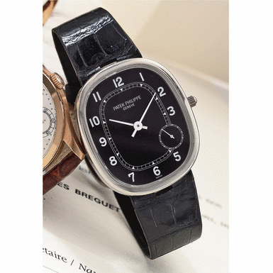 PATEK PHILIPPE - A white gold oval automatic wristwatch 1997 REF 5028G ELLIPSE MVT 1964520 CASE 4032664
