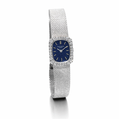 PATEK PHILIPPE - A lady's white gold and diamond set cushion form wristwatch circa 1970 ref 4102G mvt 1240285 case 2692395