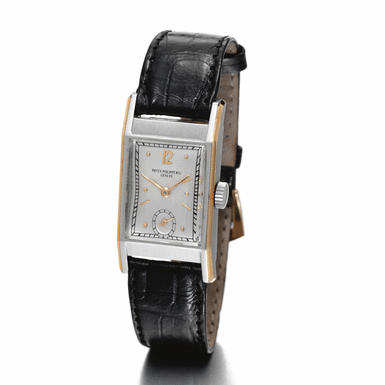 PATEK PHILIPPE - A stainless steel and pink gold tonneau-form wristwatch 1943 ref 522AR mvt 835799 case 624312