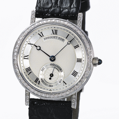 BREGUET, A WHITE GOLD AND DIAMOND SET WRISTWATCH CIRCA 2000 MARINE