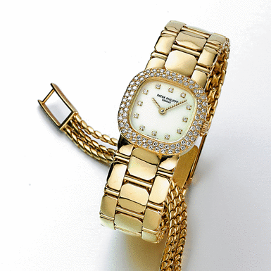 PATEK PHILIPPE, A LADY'S GOLD AND DIAMOND-SET&&NBSP - CUSHION FORM BRACELET WATCH&&NBSP - CIRCA 1985 REF 4720/1J MVT 1604586 CASE 2845053
