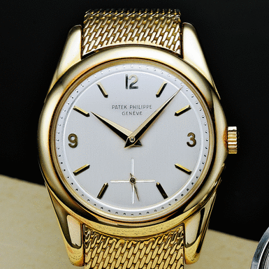 PATEK PHILIPPE, A FINE AND RARE GOLD WRISTWATCH WITH BRACELET CIRCA 1960