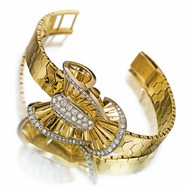 ROLEX - A LADY'S GOLD DIAMOND-SET BRACELET WATCH WITH CONCEALED DIAL CIRCA 1940 REF 2293