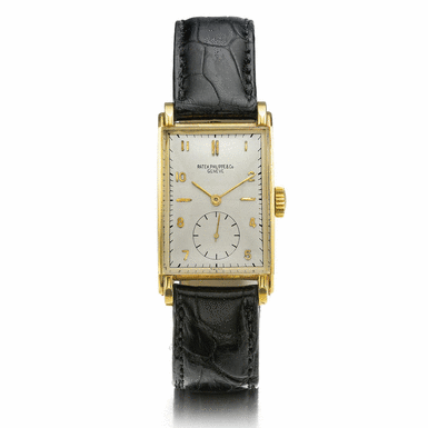 PATEK PHILIPPE - A GOLD CURVED RECTANGULAR WRISTWATCH 1947 REF 1559J MVT 839189 CASE 645627