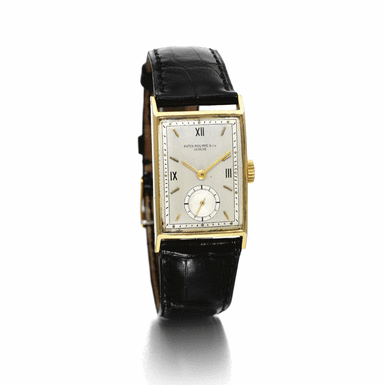 PATEK PHILIPPE - A RARE GOLD CURVED RECTANGULAR WRISTWATCH 1942 REF 1470J MVT 835241 CASE 628538