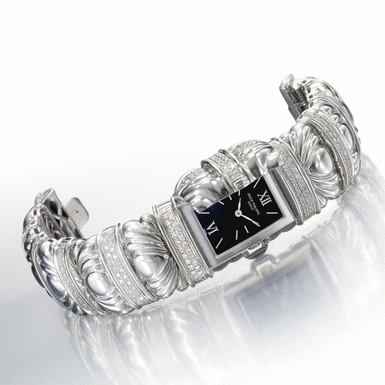 PATEK PHILIPPE - A LADY'S WHITE GOLD DIAMOND-SET RECTANGULAR BRACELET WATCH WITH CONCEALED DIAL 1999 REF 4955/20 MVT 1970666 CASE 4089878
