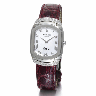 ROLEX - A LADY'S WHITE GOLD AND DIAMOND SET RECTANGULAR WRISTWATCH WITH HOODED LUGS CIRCA 2002 REF 6692 CELLINI