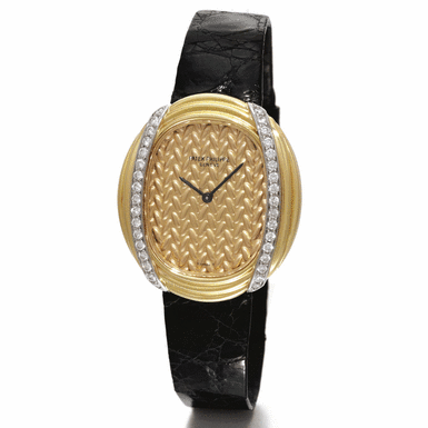 PATEK PHILIPPE - A LADY'S YELLOW GOLD AND DIAMOND-SET OVAL WRISTWATCH 1978 REF 4288J MVT 1392796 CASE 2764664