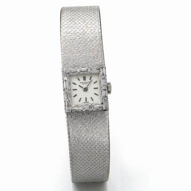 PATEK PHILIPPE - A LADY'S WHITE GOLD AND DIAMOND SET BRACELET WATCH CIRCA 1965 REF 3312/2G MVT 992939 CASE 2640986