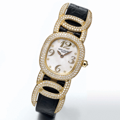 PATEK PHILIPPE - A LADY'S YELLOW GOLD AND DIAMOND SET WRISTWATCH WITH MOTHER-OF-PEARL DIAL CIRCA 1998 REF 4832J GOLDEN ELLIPSE MVT 1629188 CASE 2996223