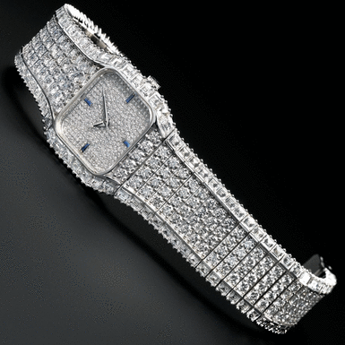 PATEK PHILIPPE - A VERY FINE AND MAGNIFICENT WHITE GOLD AND PAV