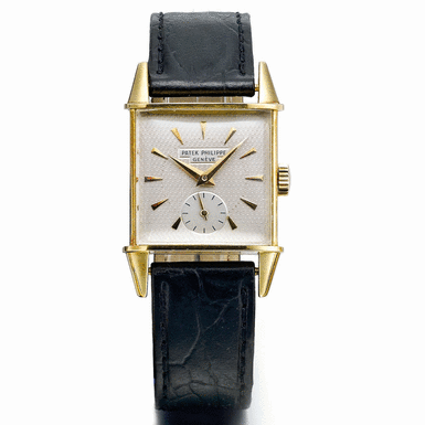PATEK PHILIPPE - A YELLOW GOLD RECTANGULAR WRISTWATCH WITH SUBSIDIARY SECONDS CIRCA 1955 REF 2491J MVT 741977 CASE 679565