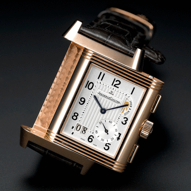 JAEGER-LECOULTRE - A PINK GOLD RECTANGULAR DOUBLE DIALED DUAL TIME ZONE WRISTWATCH WITH 8-DAY POWER RESERVE, GMT, DATE AND DAY/NIGHT INDICATION CIRCA 2007 REVERSO GRANDE GMT