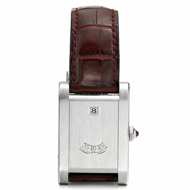 CARTIER - A FINE LIMITED EDITION PLATINUM RECTANGULAR JUMP HOUR WRISTWATCH CIRCA 1997 TANK 
