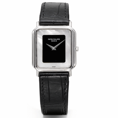 PATEK PHILIPPE - A WHITE GOLD RECTANGULAR WRISTWATCH WITH MOTHER-OF-PEARL DIAL CIRCA 1981 REF 3895G MVT 1366757 CASE 2793832