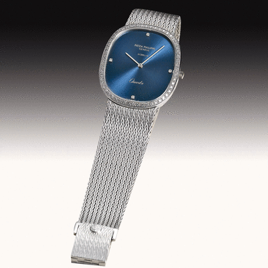 PATEK PHILIPPE - A WHITE GOLD AND DIAMOND-SET ELLIPTICAL BRACELET WATCH CIRCA 1981 REF 3875/1 ELLIPSE RETAILED BY G