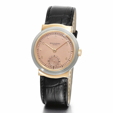 PATEK PHILIPPE - A FINE STAINLESS STEEL AND 18K PINK GOLD WRISTWATCH WITH PINK DIAL 1945 REF 544/1R MVT 927636 CASE 509135
