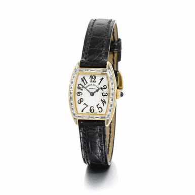 FRANCK MULLER - A LADY'S 18K YELLOW GOLD AND DIAMOND-SET TONNEAU WRISTWATCH CIRCA 2000 REF 2500 NO 05