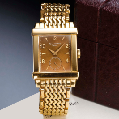 PATEK PHILIPPE - A LIMITED EDITION YELLOW GOLD RECTANGULAR BRACELET WATCH CIRCA 2001 REF 5011/1J CORTINA GONDOLO MVT 1877556 CASE 4159862