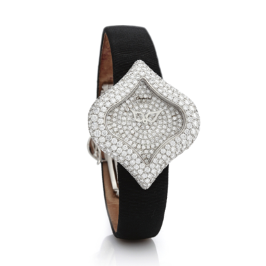 CHOPARD - A LADY'S 18K WHITE GOLD AND DIAMOND-SET LOZENGE-SHAPED WRISTWATCH CIRCA 2000 PUSHKIN