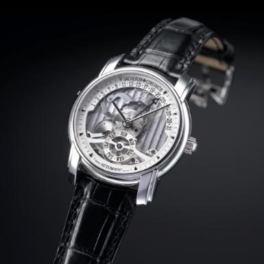 VACHERON CONSTANTIN - A FINE LIMITED EDITION PLATINUM SKELETONIZED AUTOMATIC WRISTWATCH WITH DAY AND RETROGRADE DATE CIRCA 2004 REF 47247 NO 105/247