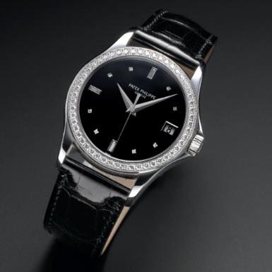 PATEK PHILIPPE - A FINE WHITE GOLD AND DIAMOND-SET AUTOMATIC SWEEP SECONDS WRISTWATCH WITH DATE CIRCA 2007 REF 5108G MVT 3407504 CASE 4366014