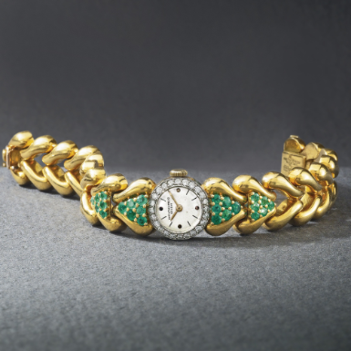 PATEK PHILIPPE - A LADY'S 18K YELLOW GOLD DIAMOND AND EMERALD-SET BRACELET WATCH 1947 REF 294 MVT 866157 CASE 653804
