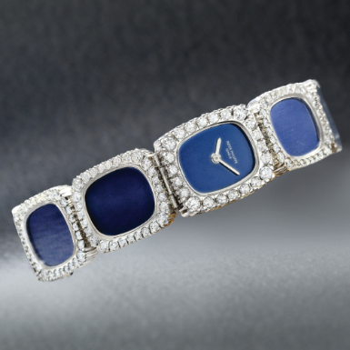 PATEK PHILIPPE - A LADY'S 18K WHITE GOLD DIAMOND-SET BRACELET WATCH 1971 REF 4122/1G ELLIPSE MVT 1242949 CASE 2693488