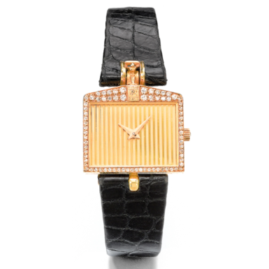 CORUM - A LADY'S YELLOW GOLD AND DIAMOND-SET WRISTWATCH CIRCA 1980 ROLLS ROYCE SPIRIT OF ECSTASY
