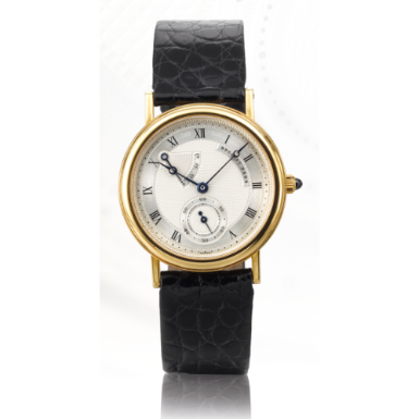 BREGUET - A YELLOW GOLD WRISTWATCH WITH POWER RESERVE INDICATION CIRCA 1990 REF 3360 CLASSIQUE