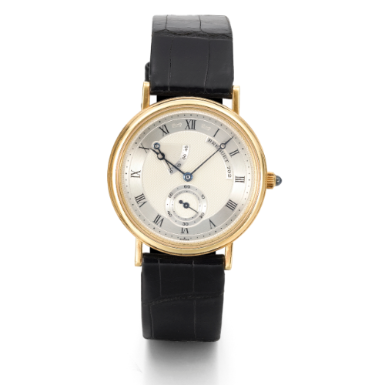 BREGUET - A YELLOW GOLD WRISTWATCH WITH POWER RESERVE INDICATION CIRCA 1990 REF 3380 CLASSIQUE
