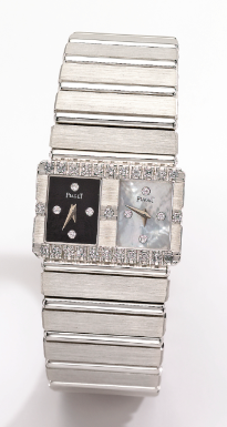 PIAGET - AN UNUSUAL 18K WHITE GOLD DIAMOND-SET DUAL TIME ZONE BRACELET WATCH CIRCA 1988 REF 15026 C701