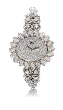 PIAGET - A LADY'S 18K WHITE GOLD AND DIAMOND-SET BRACELET WATCH CIRCA 1985 REF 355131