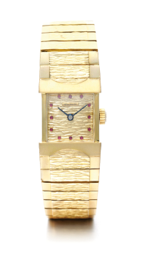 PATEK PHILIPPE - A LADY'S 18K YELLOW GOLD AND RUBY BRACELET WATCH 1962 REF 3409 MVT 977553 CASE 2622852
