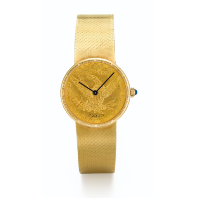 CORUM - A YELLOW GOLD COIN BRACELET WATCH CIRCA 1990