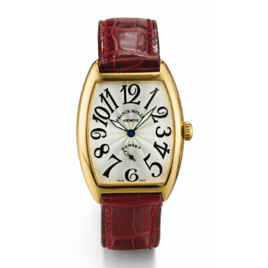 FRANCK MULLER - A LADY'S YELLOW GOLD TONNEAU-FORM WRISTWATCH CIRCA 1995 REF 7500 S6 SUNSET NO 61