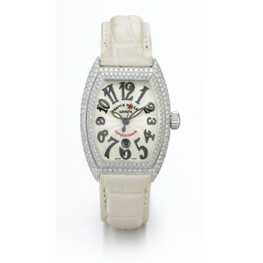 FRANCK MULLER - A LADY'S WHITE GOLD AND DIAMOND-SET AUTOMATIC CENTER SECONDS TONNEAU FORM WRISTWATCH WITH DATE CIRCA 2005 REF 8002 L SC D CONQUISTADOR