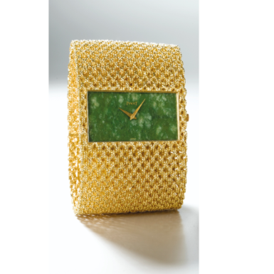 PIAGET - A FINE AND RARE LADY'S YELLOW GOLD BRACELET WATCH WITH NEPHRITE DIAL CIRCA 1975