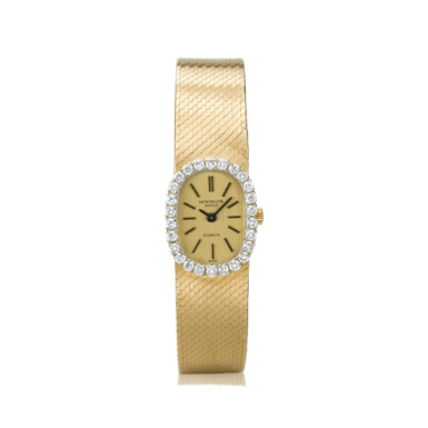 PATEK PHILIPPE - A LADY'S YELLOW GOLD, WHITE GOLD AND DIAMOND-SET OVAL BRACELET WATCH, RETAILED BY G