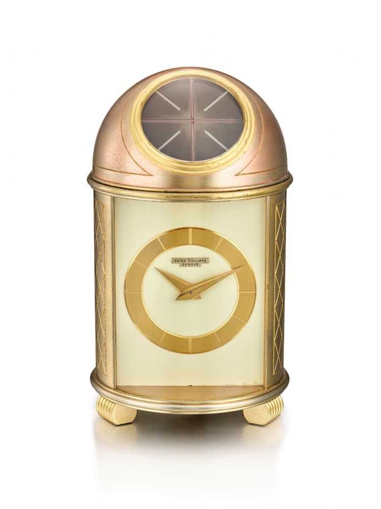 PATEK PHILIPPE | REFERENCE 701, A GILT BRASS SOLAR POWERED DOME TABLE CLOCK, MADE IN 1953 | 百達翡麗 | 型號701 鍍金銅製太陽能座鐘，機芯編號872586，外殼編號113，1953年製