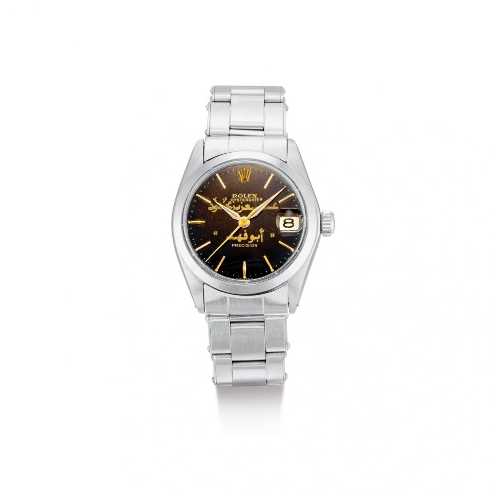 ROLEX | REFERENCE 6466, A STAINLESS STEEL WRISTWATCH WITH TROPICAL DIAL, DATE AND BRACELET, CIRCA 1975 | 勞力士 | 型號6466 精鋼鏈帶腕錶，備棕色錶盤及日期顯示，錶殼編號3994651，約1975年製