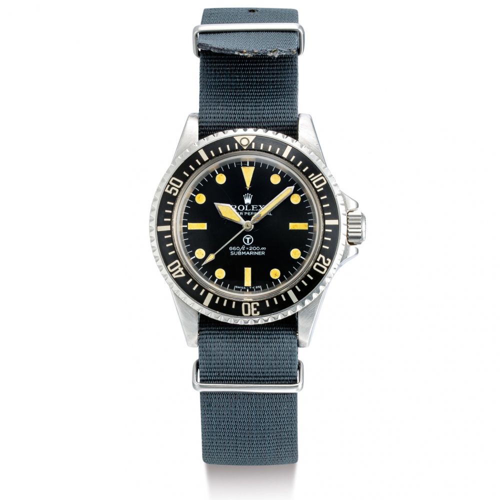 ROLEX | MILITARY SUBMARINER, REFERENCE 5517, A STAINLESS STEEL MILITARY WRISTWATCH WITH REVOLVING BEZEL, FIXED BAR LUGS AND MILITARY ENGRAVINGS, CIRCA 1977 | 勞力士 | Military Submariner 型號5517 精鋼軍用腕錶，備迴轉錶圈及軍用印記，錶殼編號5212927，約1977年製